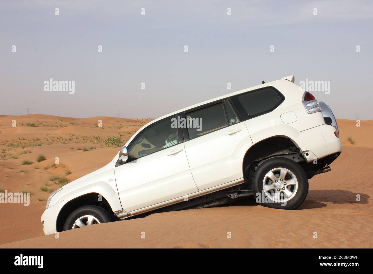Toyota Prado 4WD (four wheel drive) vehicle, SUV, goes offroad in huge