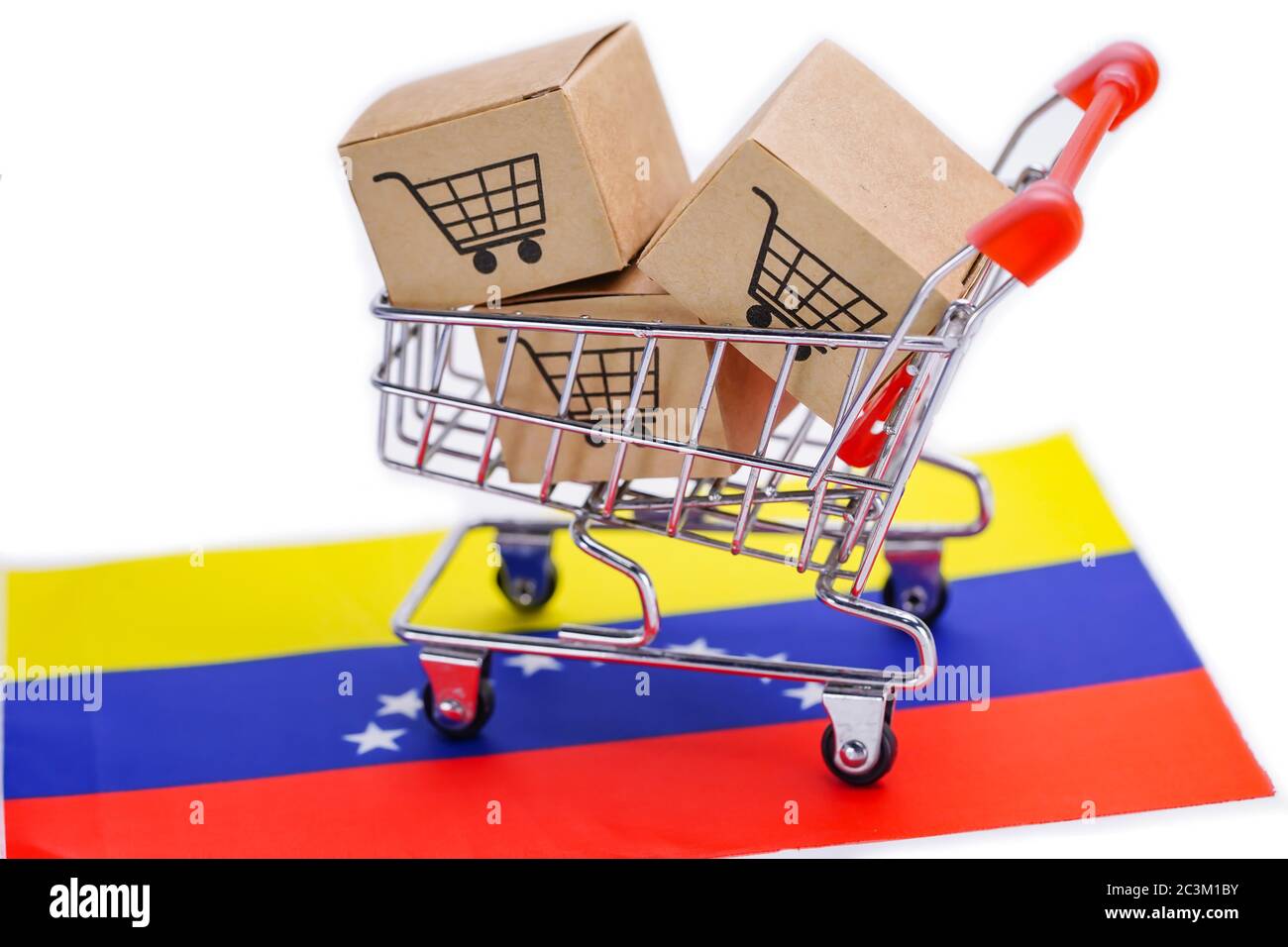 Box with shopping cart logo and Venezuela flag Import Export Shopping