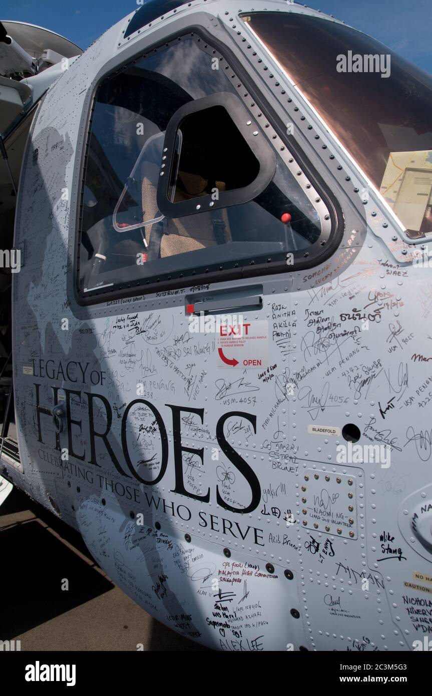 SINGAPORE - FEBRUARY 15: Military version of Sikorsky S-92 helicopter, Legacy of Heroes, signed by visitors from all over the world, on display at Sin Stock Photo