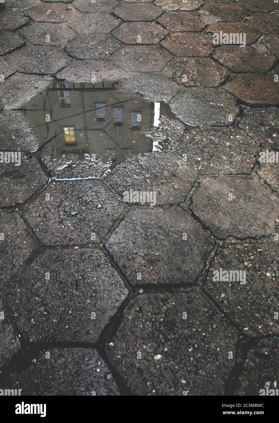 Reflection puddle brick sidewalk hi-res stock photography and images ...