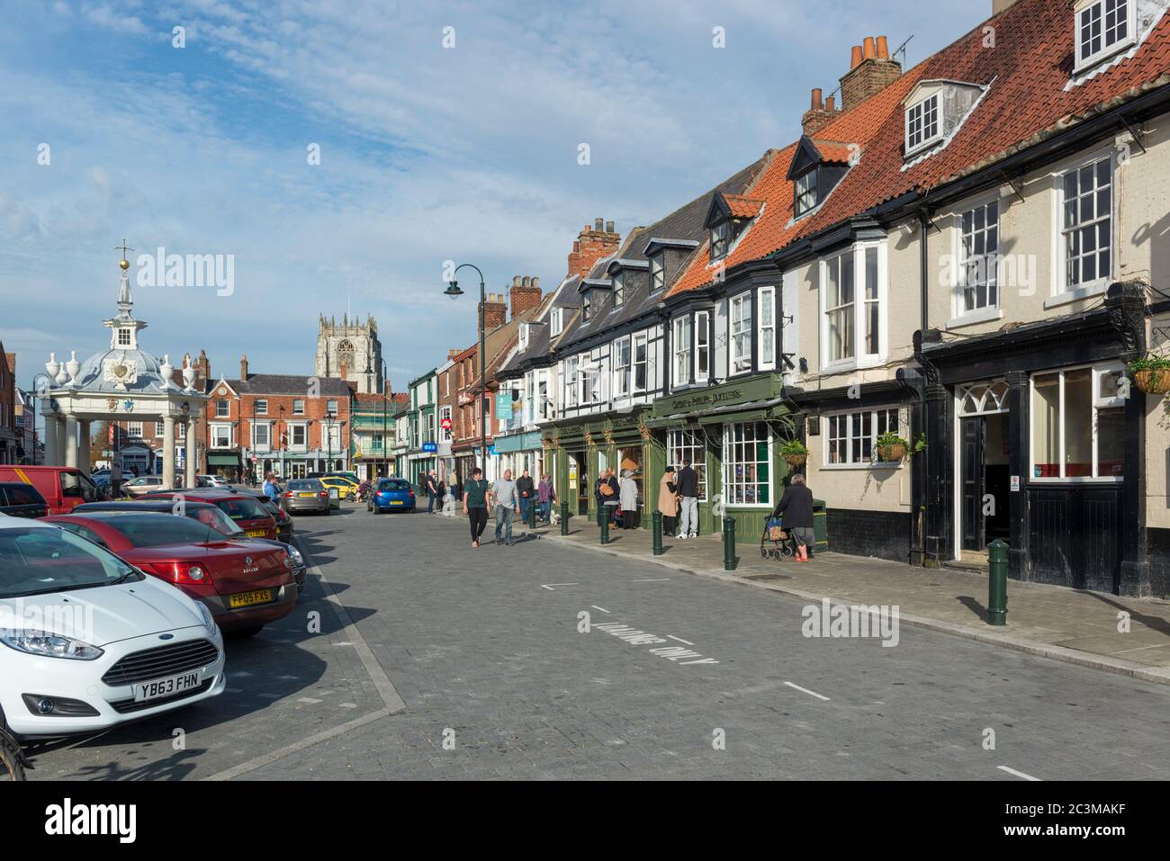 panoramic view of shops and a pub around Saturday Market in the centre of Beverley, East Yorkshire Stock Photo
