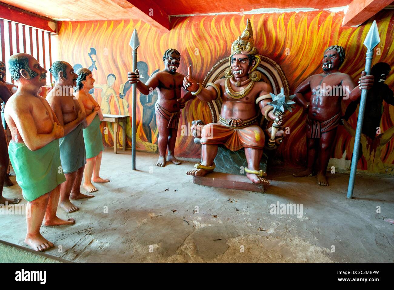 Sinners prepare to face their punishment in a scene displayed in the Chamber of Horrors at Wewurukannala Vihara at Dickwella in southernSri Lanka. Stock Photo
