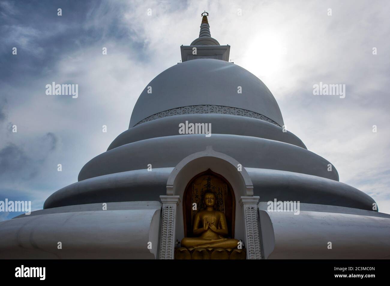 The stupa at the Peace Pagoda and Japanese Temple at Jungle Beach near Unawatuna in southern Sri Lanka. Stock Photo
