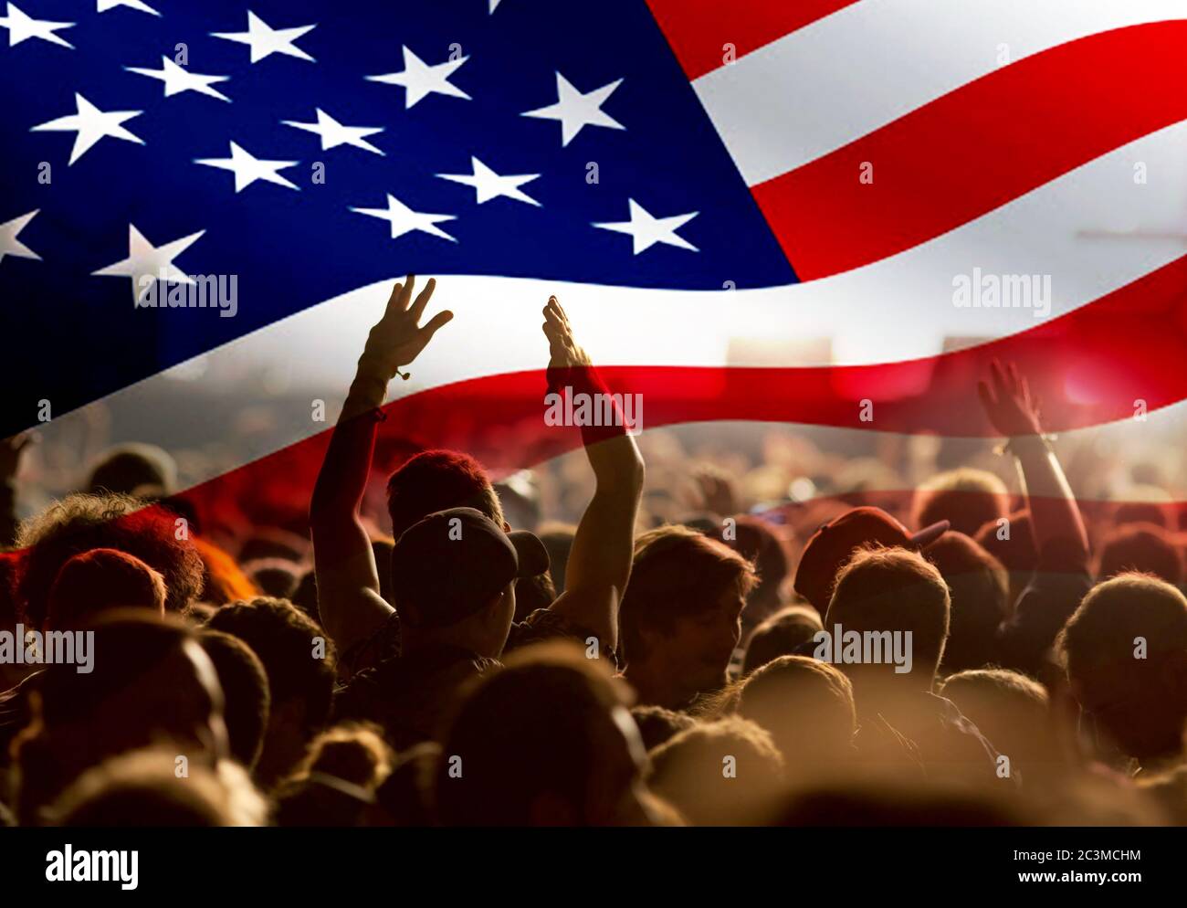 crowd celebrating Independence Day. United States of America USA flag with fireworks background for 4th of July Stock Photo