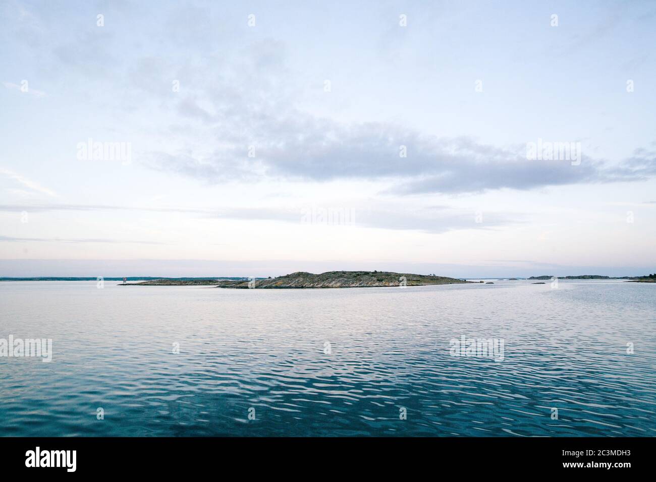 Beautiful sea under cloudy sky Stock Photo - Alamy