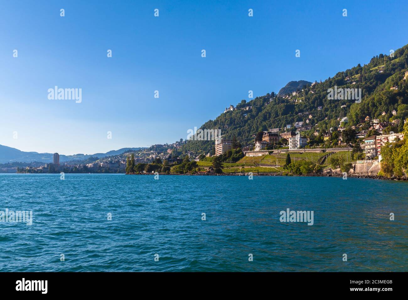 Beautiful view of  Geneva lake and Montreux city at dusk on a summer day, Canton of Vaud, Switzerland Stock Photo