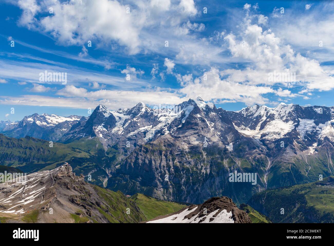 Panorama view of the famous peaks: Eiger, Monch and Jungfrau of Swiss Alps on Bernese Oberland, form top of Schilthorn, Canton of Bern, Switzerland. Stock Photo