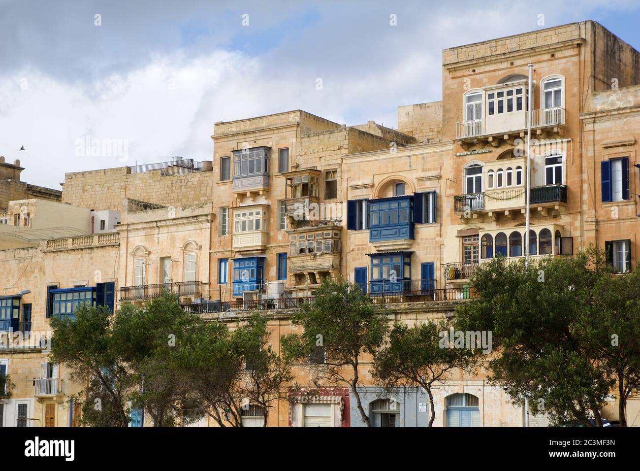 VALLETTA, MALTA - DEC 31st, 2019 Typical Maltese buildings with gallarija, traditional enclosed wooden balconies Stock Photo
