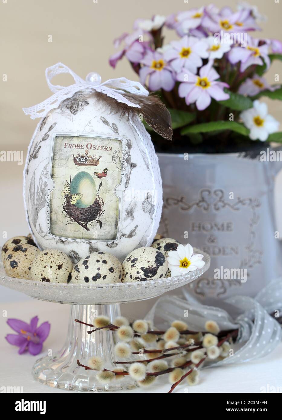 easter decoration with easter egg, quail eggs and primrose Stock Photo