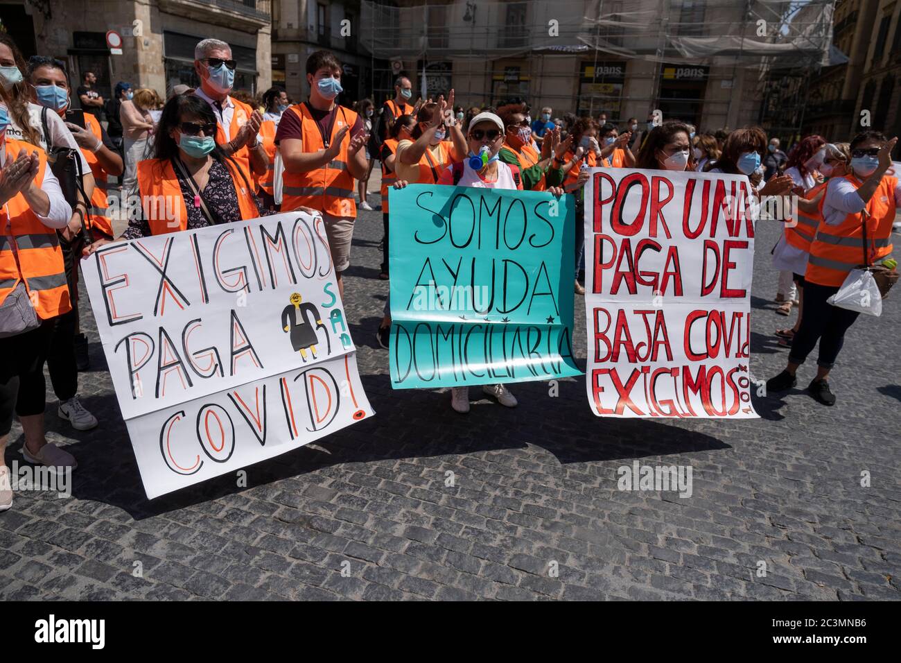 Protesters are seen with placards denouncing the poor attention of public health services and budget cuts during the demonstration.Convened by the Marea Blanca collective, workers and users of public health have demonstrated against privatization and for the right to public health that truly serves people. Stock Photo