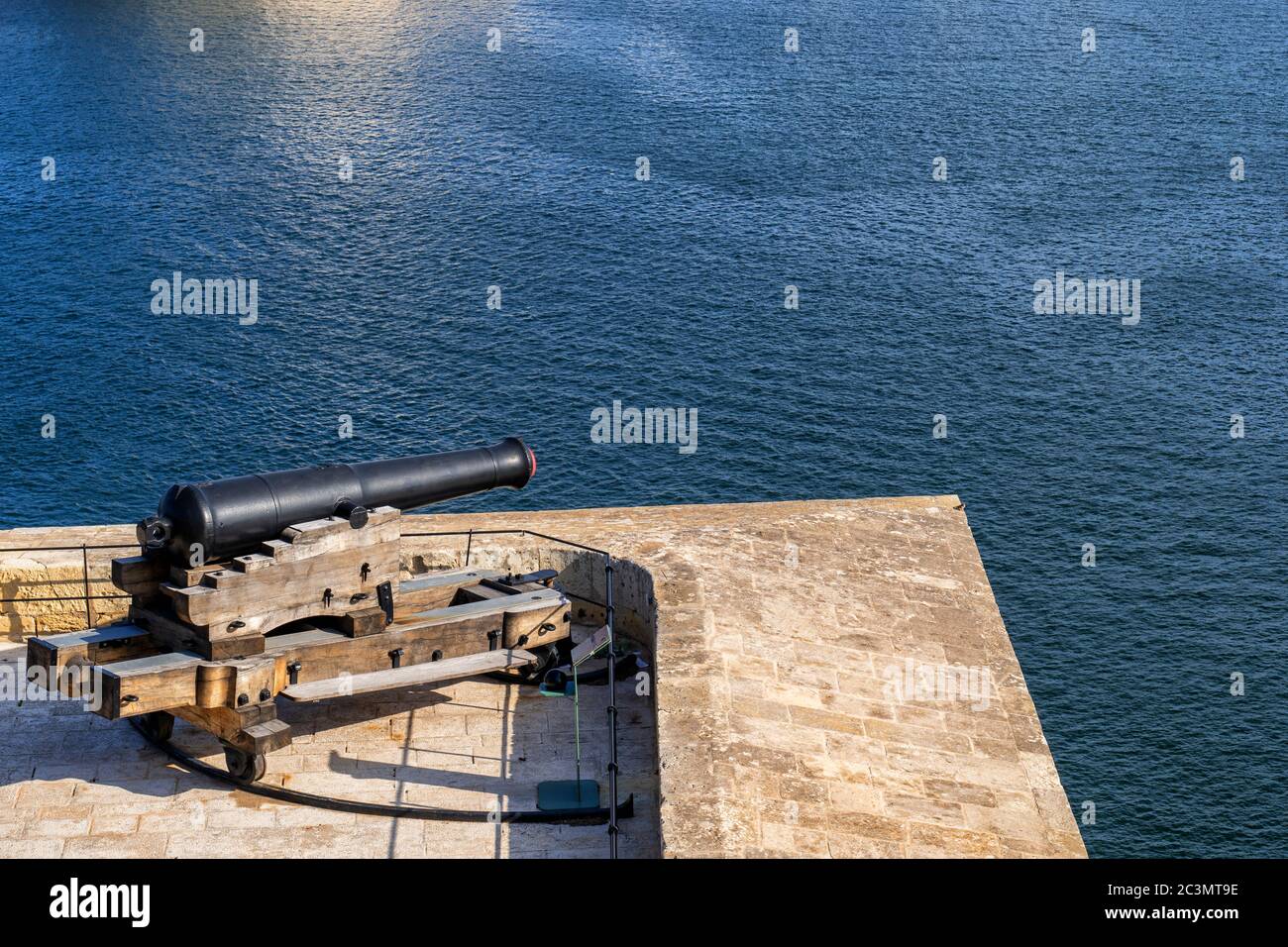 Cannon of Saluting Battery in Valletta, Malta, artillery gun facing the Grand Harbour in the Mediterranean Sea Stock Photo