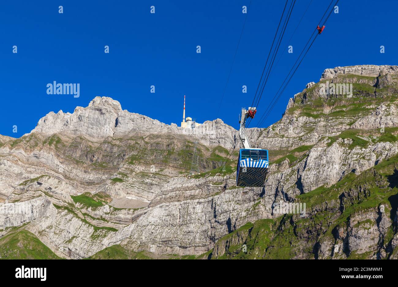 Cablecar running towards Santis (Santis) a famous peak of the Swiss Alps,  Canton of Appenzell, Switzerland Stock Photo