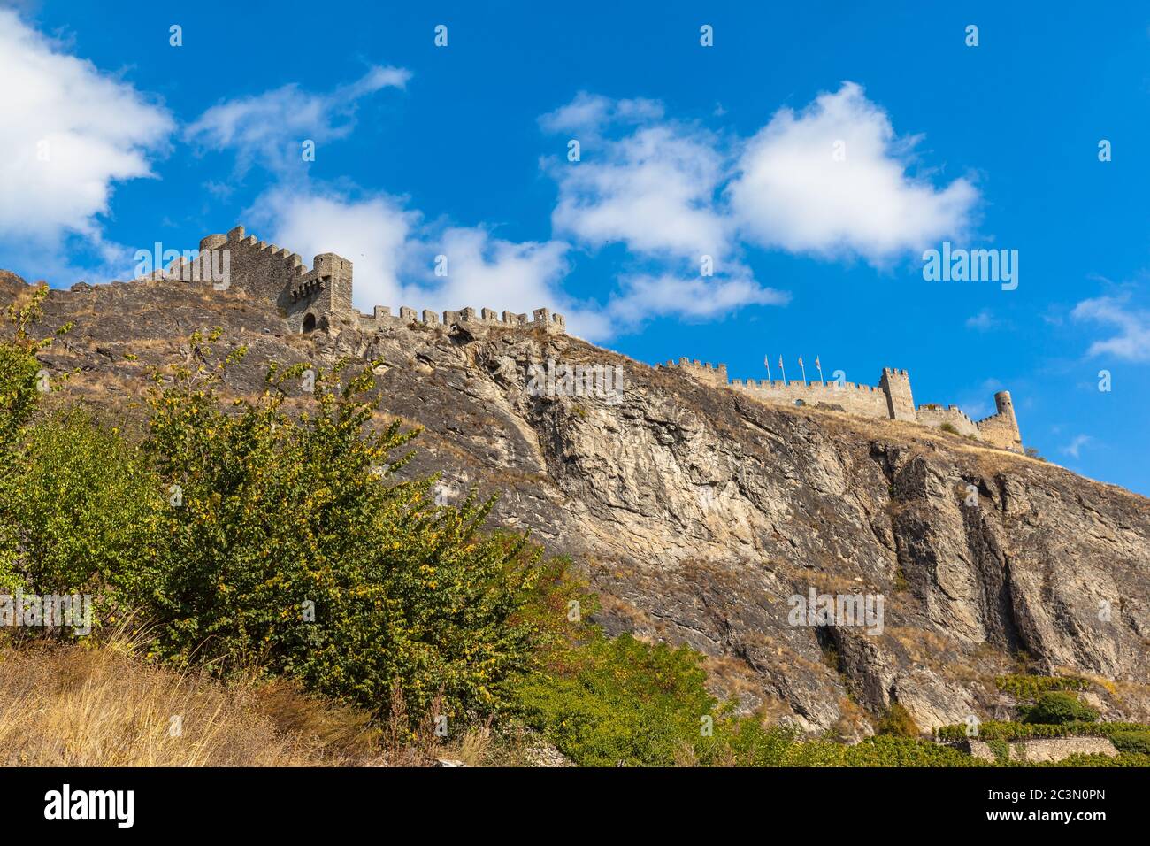 View of the ruins of the Tourbillon castle in Sion on a sunny day ...