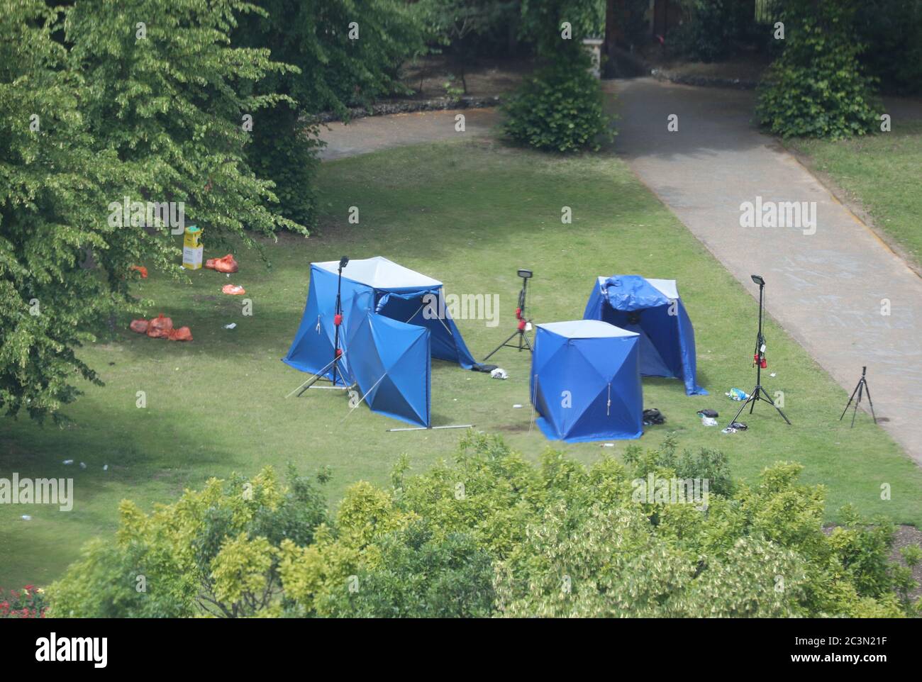 Police tents in Forbury Gardens in Reading town centre at the scene of a multiple stabbing attack which took place at around 7pm on Saturday leaving three people dead and another three seriously injured. Stock Photo