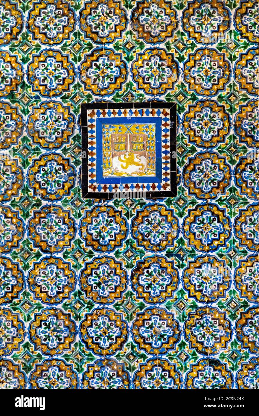 Wall richly decorated with colourful azulejos ceramic tiles at Casa de Pilatos (Pilate's House), Seville, Andalusia, Spain Stock Photo