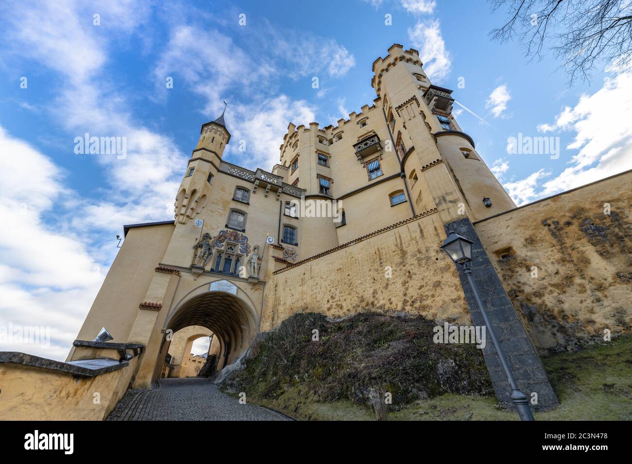 Close view of the Hohenschwangau Castle at the entrance on a sunny day in winter, Schwangau, Bavaria, Germany Stock Photo
