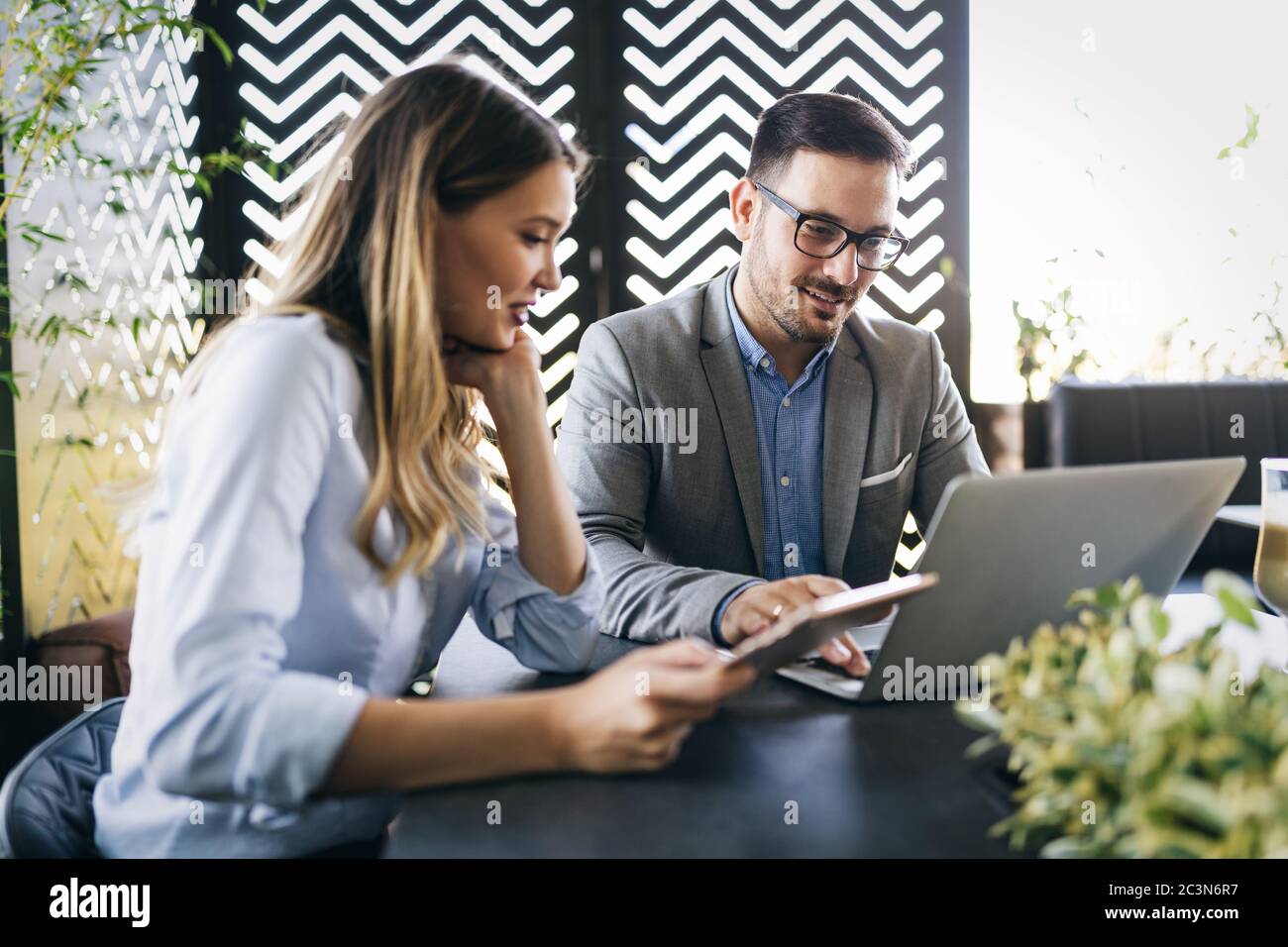 Programmers working in a software developing company office Stock Photo