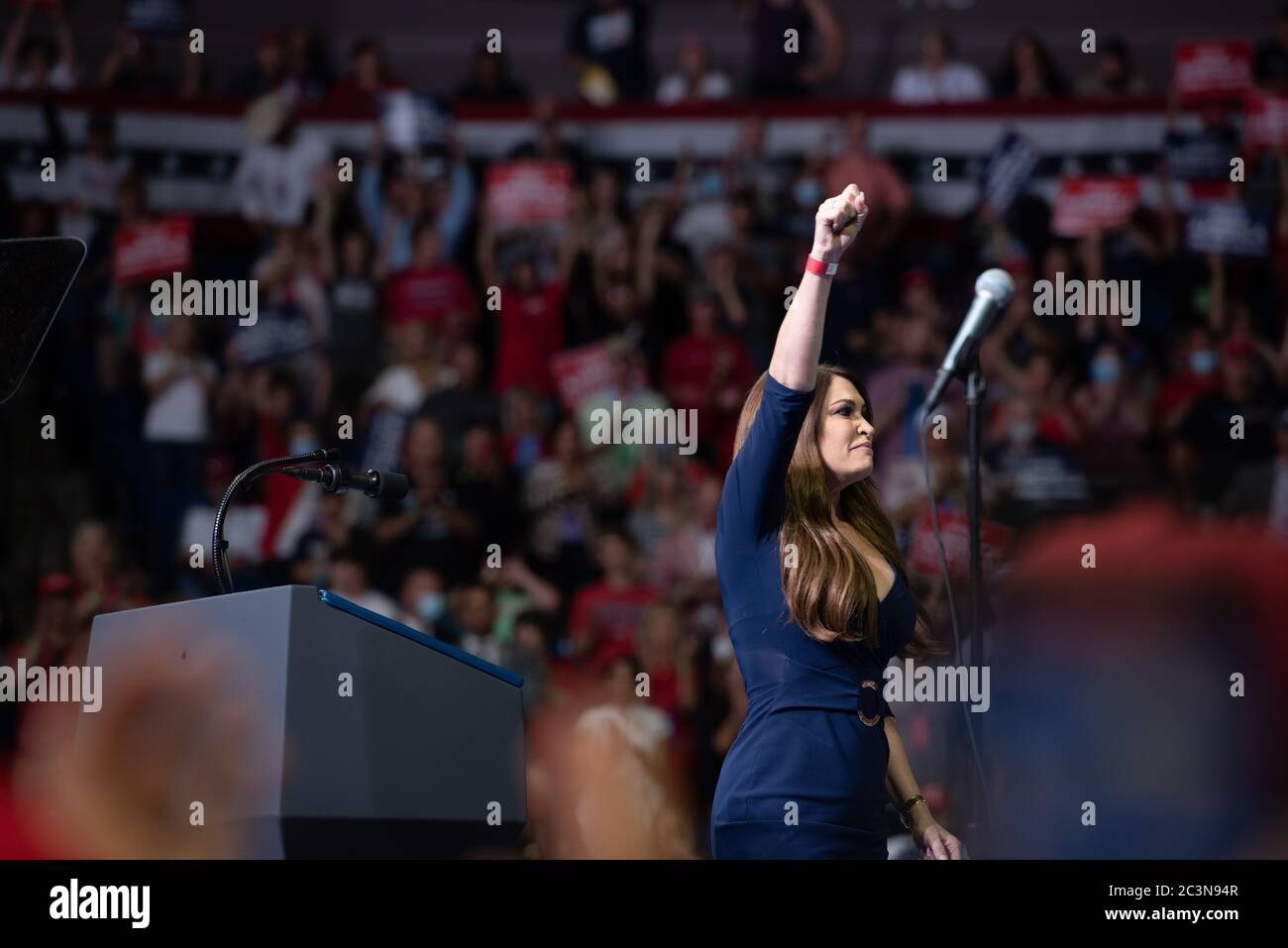 TULSA, Oklahoma, USA.  - June 20, 2020: Finance Advisor of Trump Victory Committee Kimberly Guilfoyle raising her hand up during speech. Stock Photo