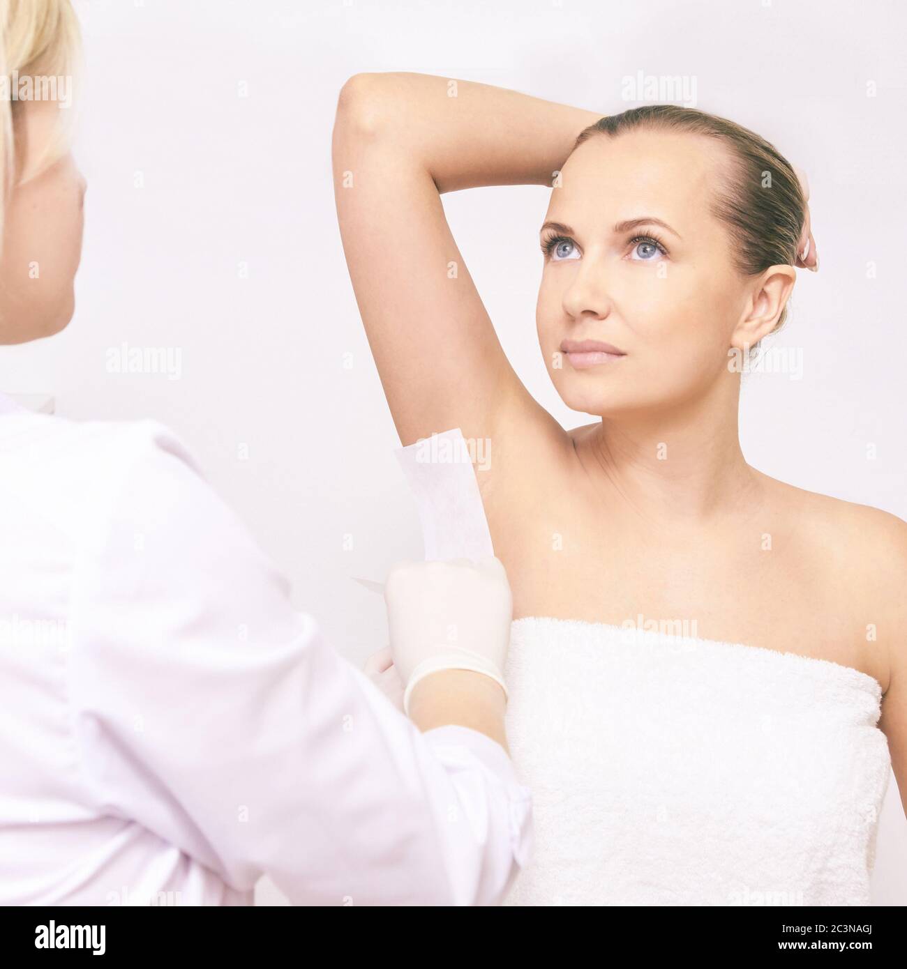 Waxing woman body. Sugar hair removal. laser service epilation. Salon