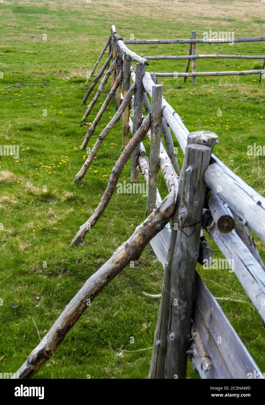 Vertical shot of a wooden fence in a rural area Stock Photo - Alamy