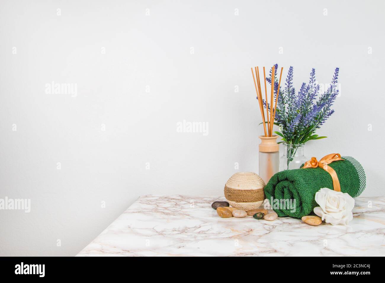Spa objects and elements on a marble table and white background Stock Photo