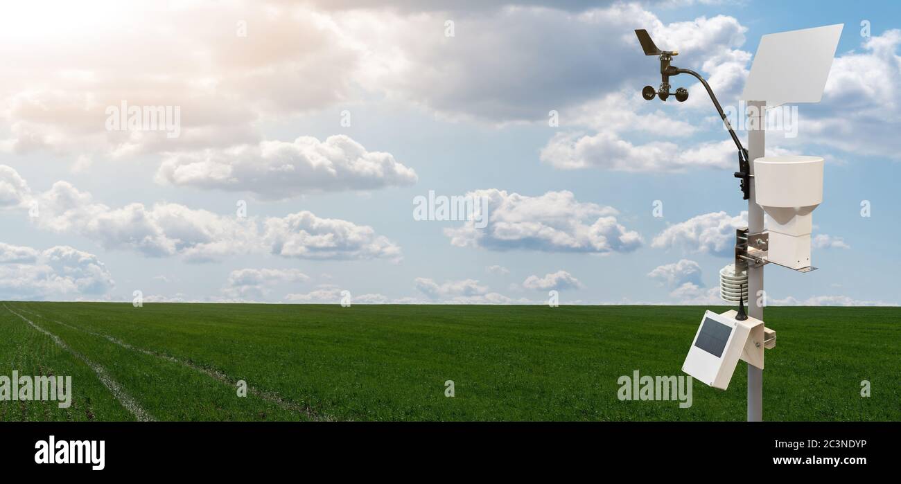 Weather station in a wheat field. Precision farming equipment Stock Photo