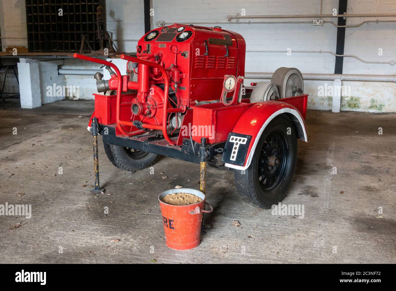 A Coventry Climax fire pump fire appliance on display in the vehicle garages, Bletchley Park, Bletchley, Buckinghamshire, Stock Photo