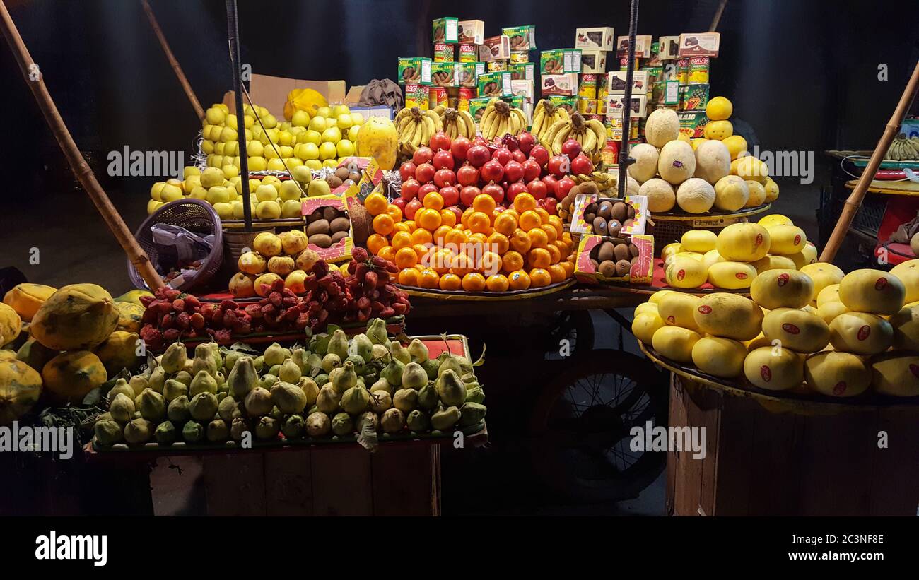 Fresh and healthy fruits on a stall at night in Sadar Bazar, Karachi