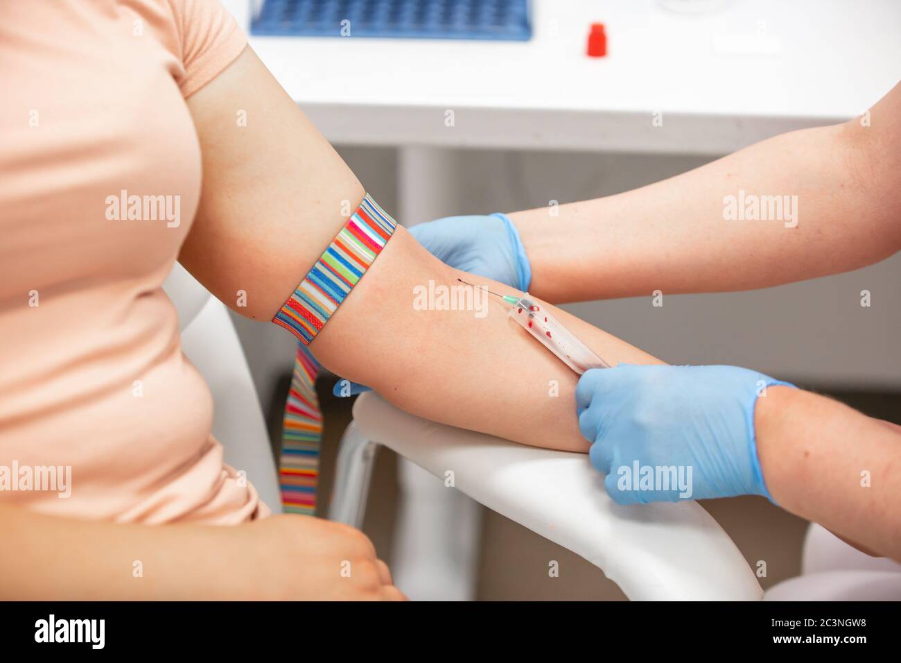 Blood collection, nurse taking blood from vein, healtcare and medical