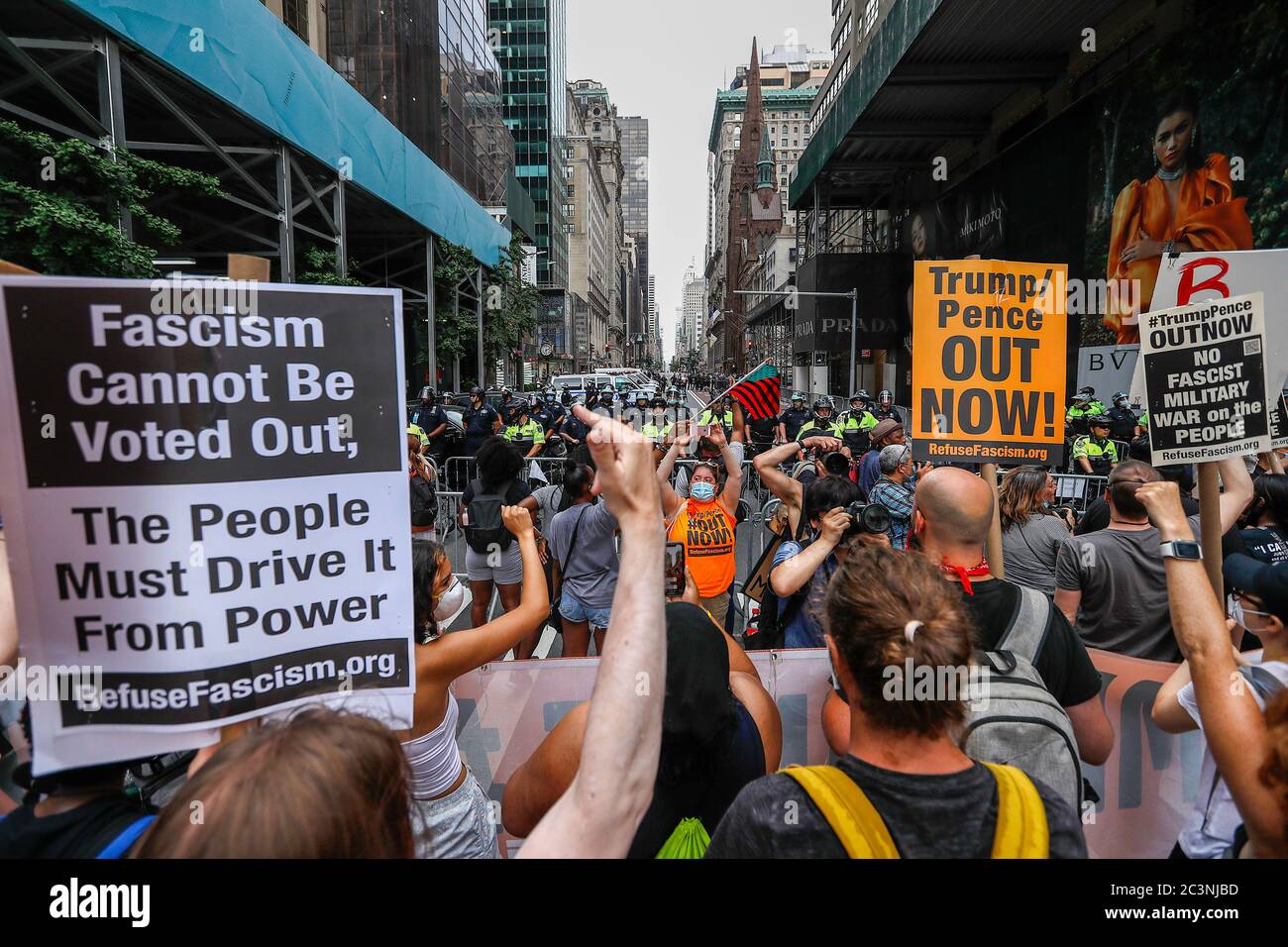 Protesters hold placards during the demonstration. Hundredths demonstrate in New York against President Trump's Fascist KKKAMPAIN and Black Lives Matter march on Juneteenth weekend. Demonstrators continue to march against police brutality and racial injustice across America. Stock Photo