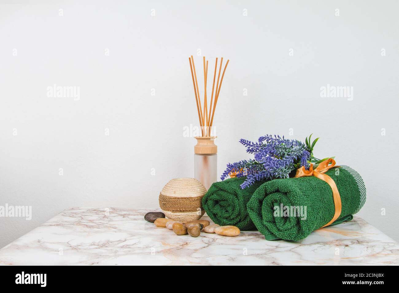 Spa objects and elements on a marble table and white background Stock Photo