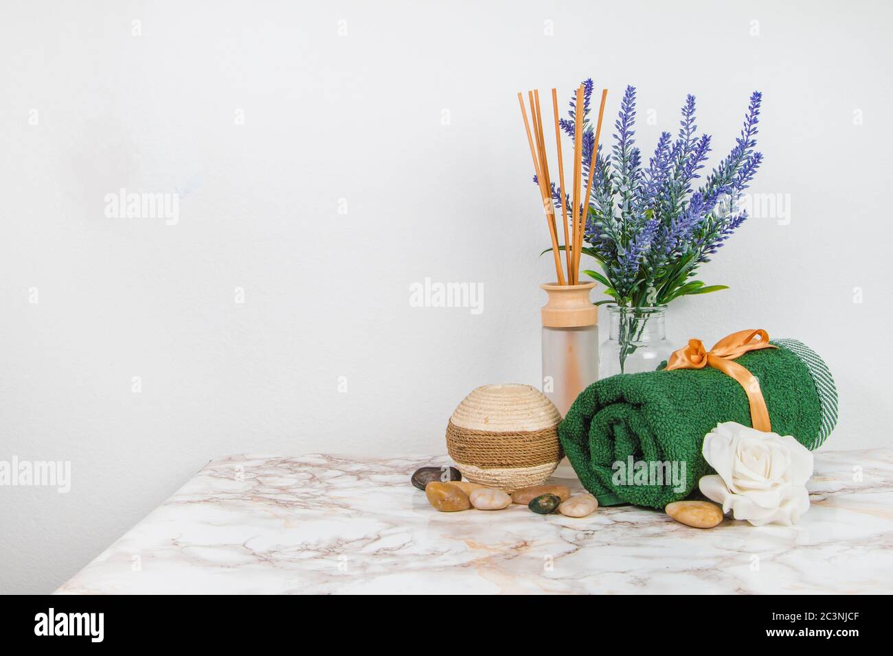 Spa objects and elements on a marble table and white background Stock Photo