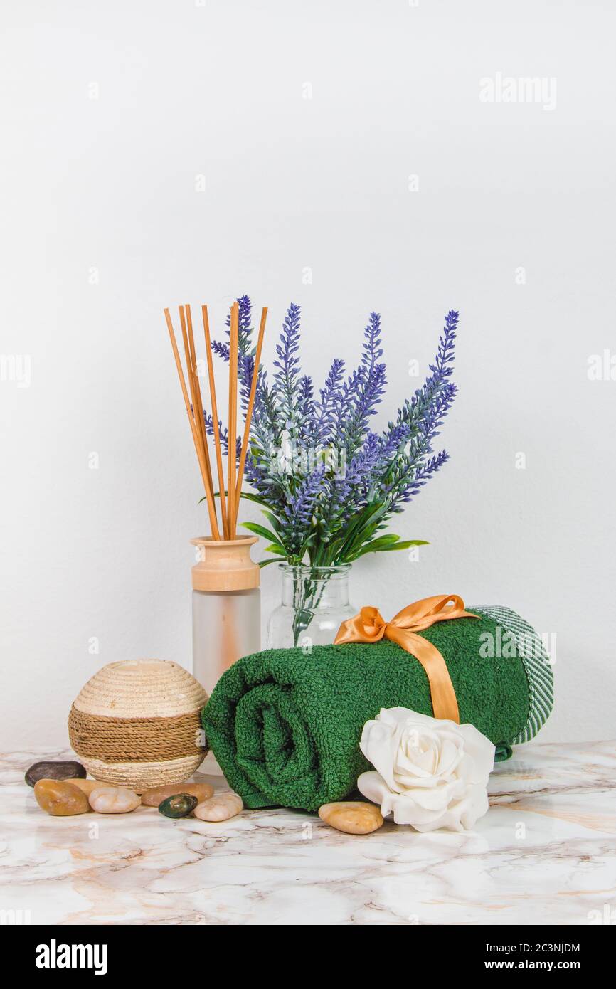 Spa objects and elements on a marble table and white background Stock Photo