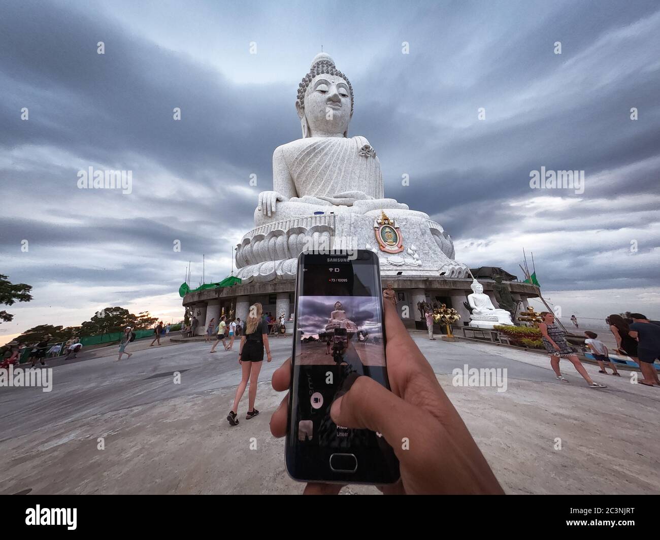 Taking Picture Of Big Buddha Statue - Maravija Buddha statue On Nakkerd Hill, Phuket, Thailand 20/11/2019 Stock Photo