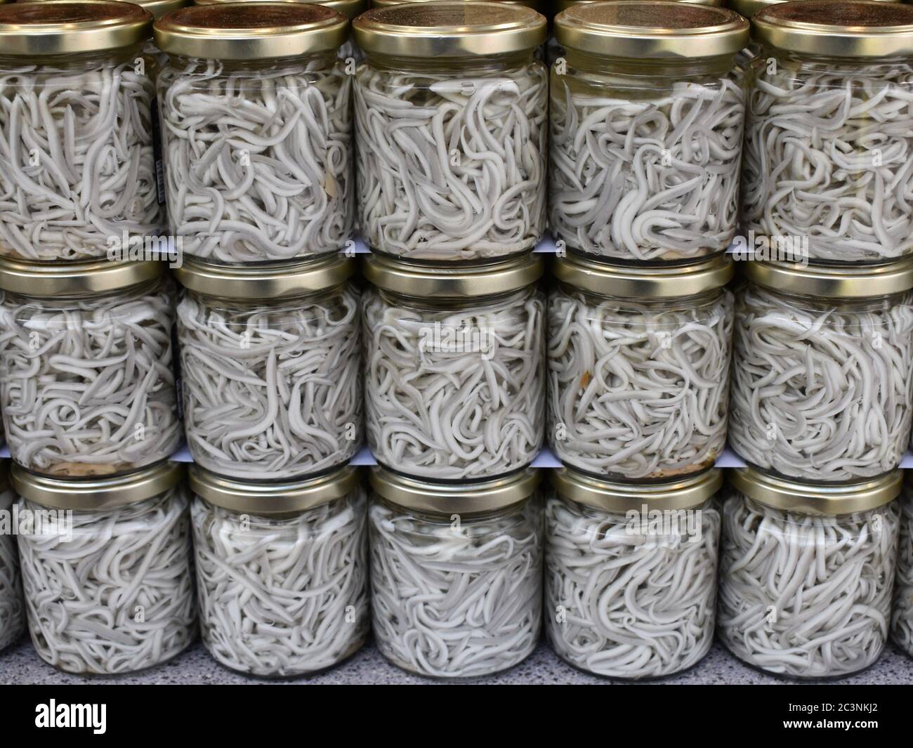 Bottles of canned fish baby eels Stock Photo Alamy