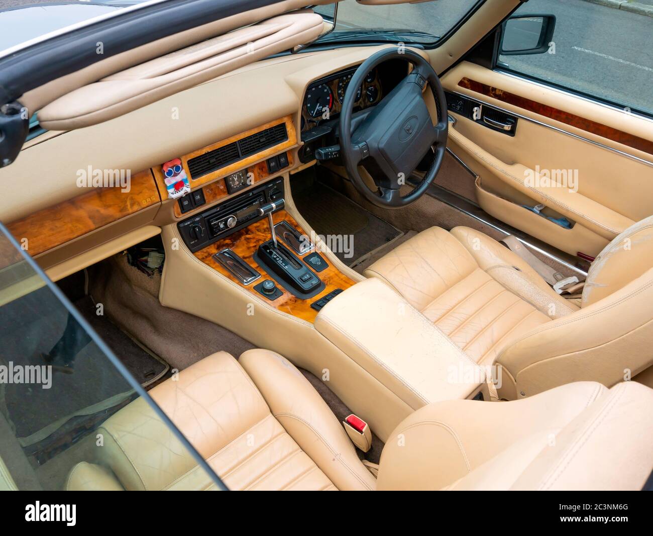A 1994-5 registered Jaguar XJS series 3 convertible cockpit, showing beige leather upholstery Stock Photo