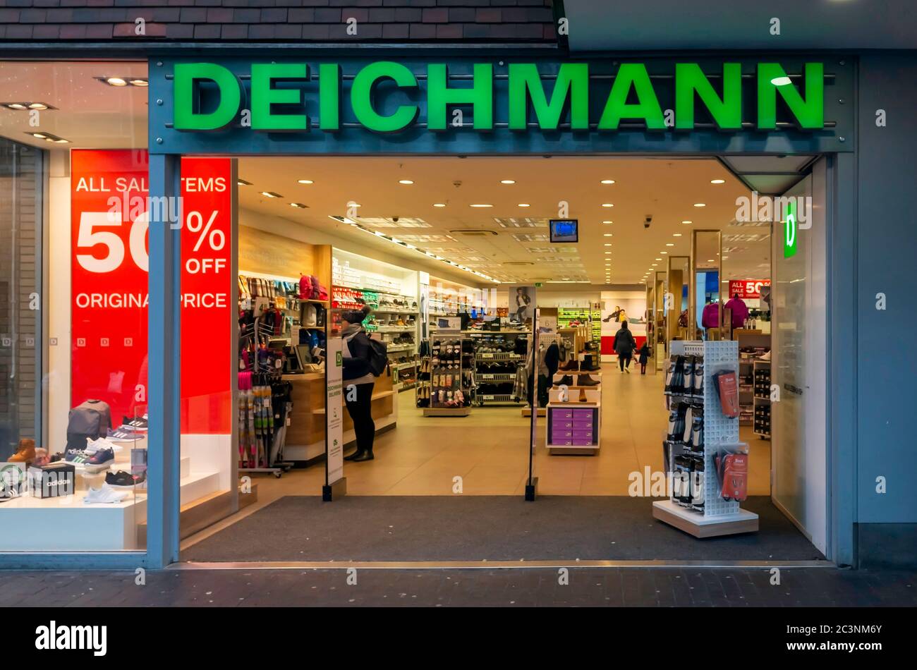 Deichmann a German chain of footwear retailers shop in Middlesbrough  Cleveland with a sale offering 50% off Stock Photo - Alamy