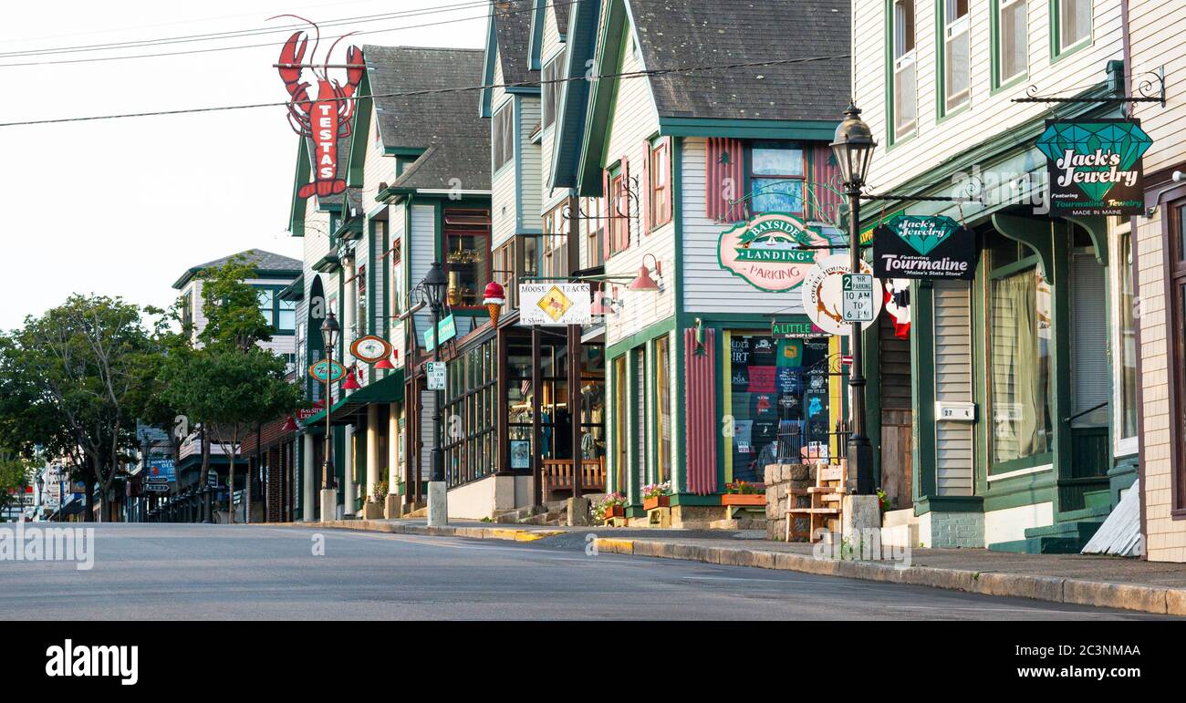 Bar Harbor, Maine, USA - 29 July 2017: Five in the morning view of the main shopping street soon to be filled with tourists walking and shopping. Stock Photo