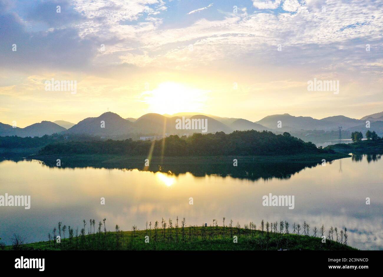 June 22, 2020, Guangan, Guangan, China: SichuanÃ¯Â¼Å'CHINA-Located in The town of Huaying City, Tianchi Lake of Guang 'an City, Sichuan Province, is the mountain lake with the largest area and the highest altitude in eastern Sichuan. In the 1950s and 1960s, a number of highly polluting enterprises were built in the lake, and the number of livestock and poultry farms increased year by year, resulting in serious pollution of the lake and worsening of the environment. In recent years, Huaying has actively practiced the concept of ecological civilization, protected clean water and green mountains, Stock Photo