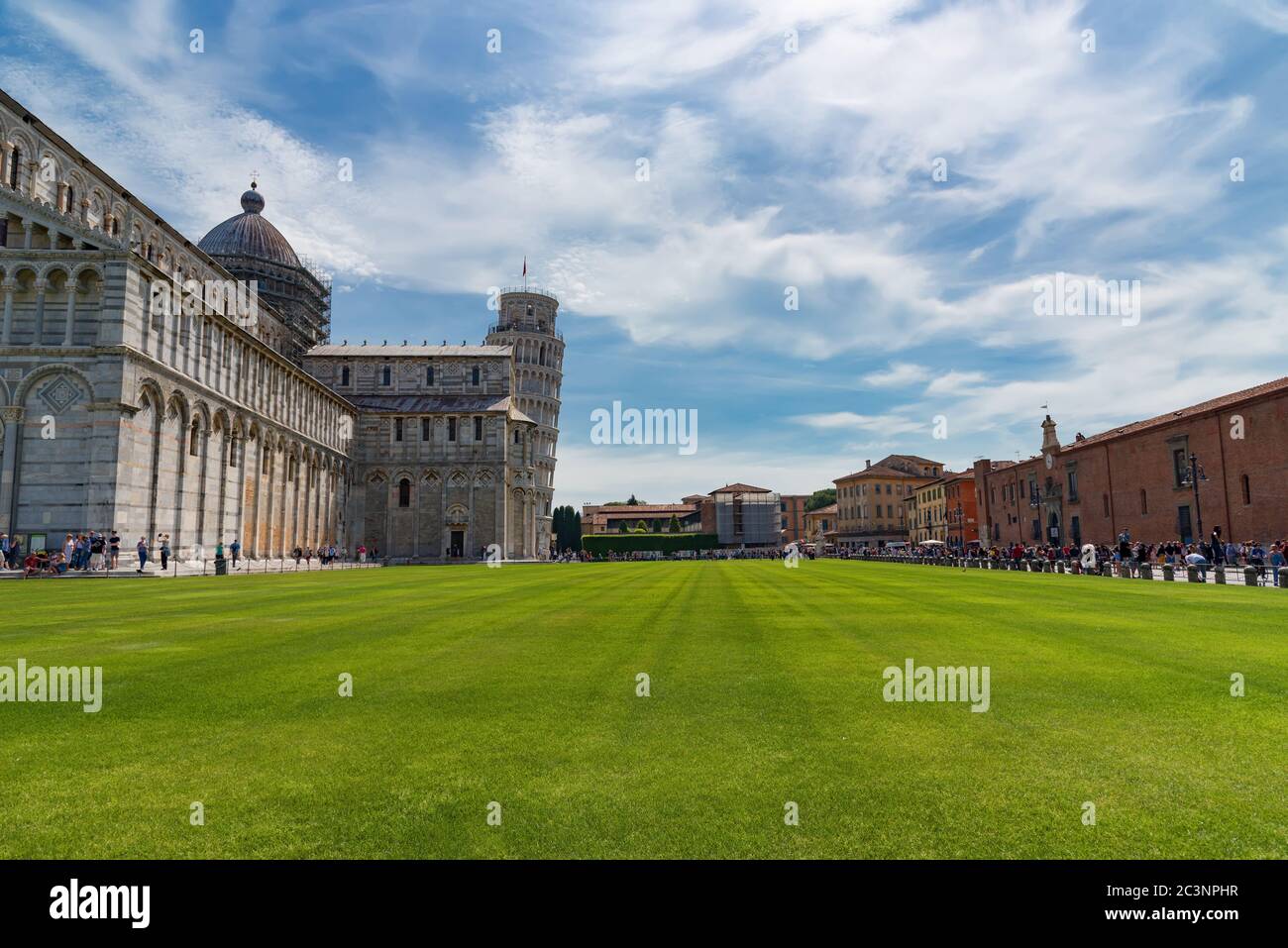 Stunning daily view at the Pisa Baptistery, the Pisa Cathedral and the Tower of Pisa. They are located in the Piazza dei Miracoli Square of Miracles Stock Photo