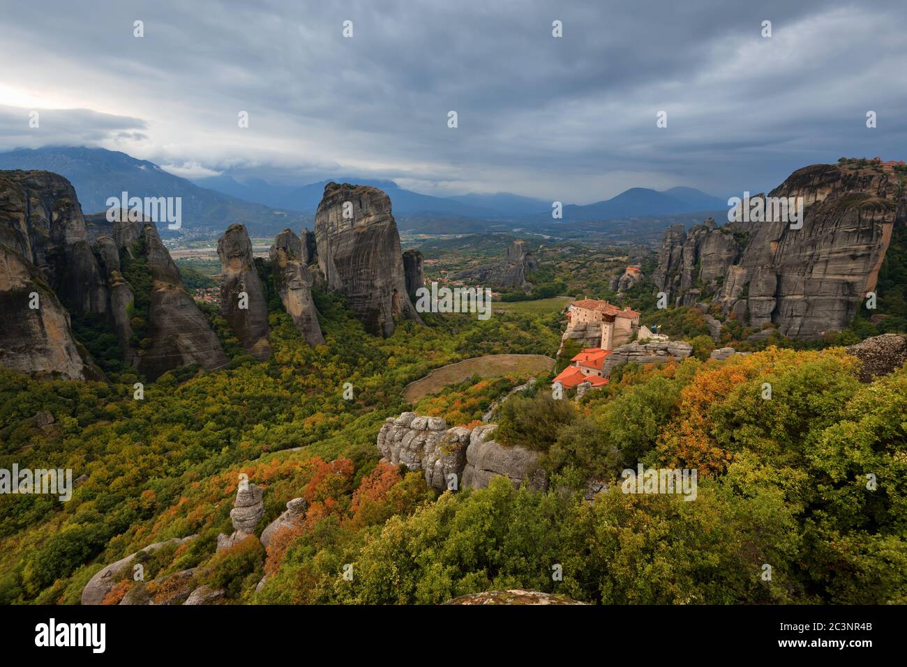 Magnificent autumn landscape.The Monastery of Rousanou or St. Barbara Monastery and the Monastery of St. Nicholas at Meteora. Stock Photo