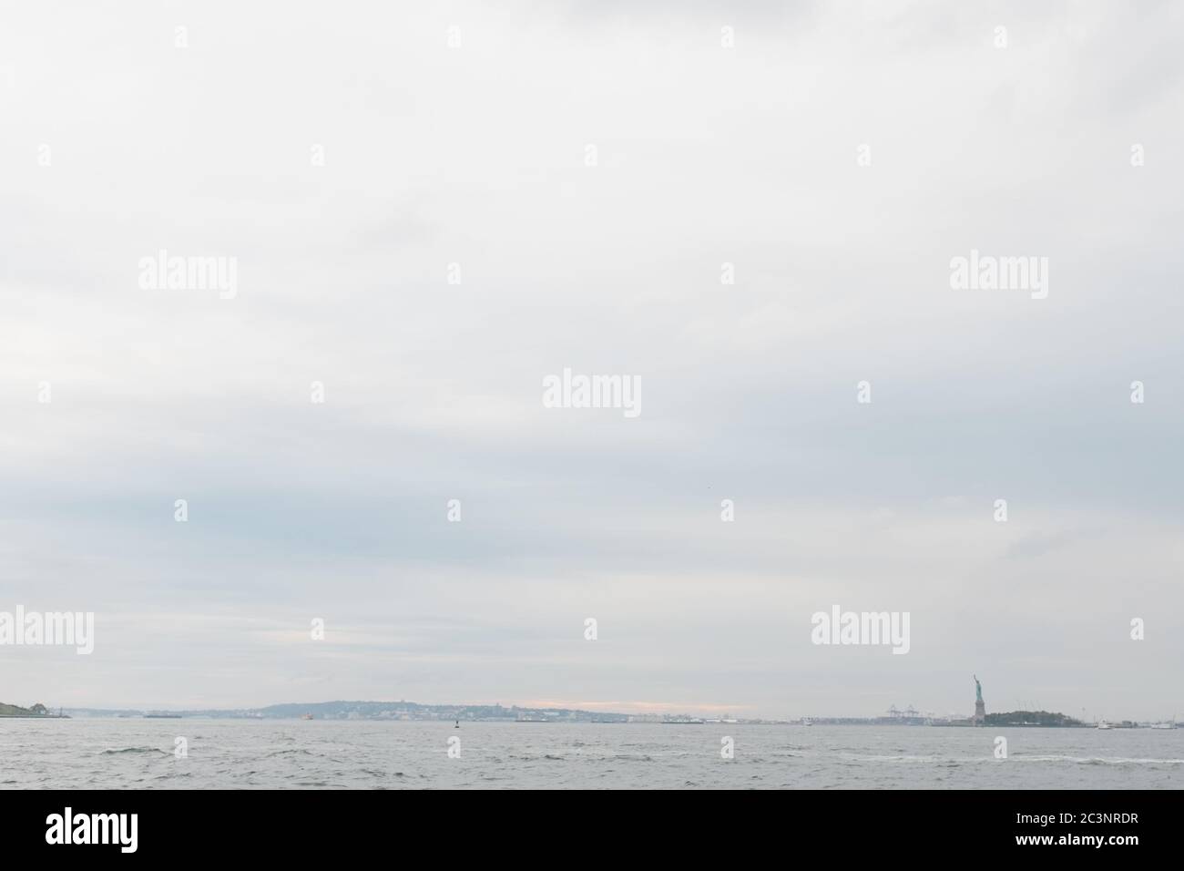 Calm sea under the cloudy sky Stock Photo - Alamy