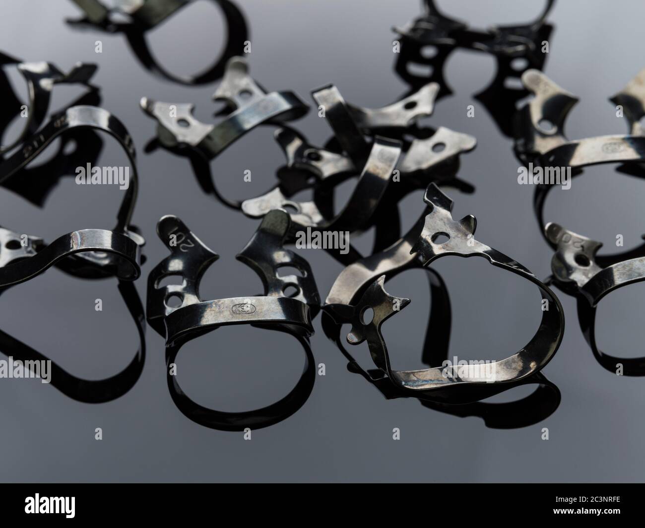 Dental Dam clamps Stock Photo Alamy