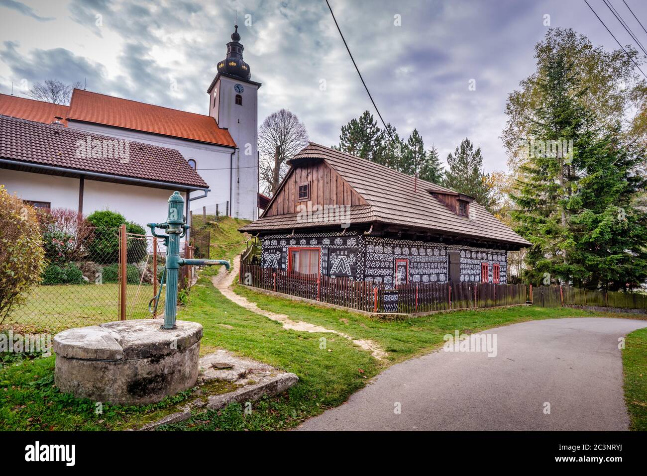 Old wooden houses in Slovakia UNESCO village Cicmany. The ornaments from Cicmany, and the Slovak folk pattern. Stock Photo