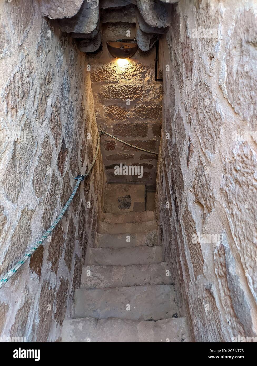 Old stone spiral staircase Stock Photo