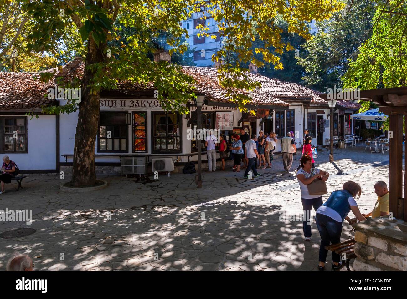 Queue of buyers in front of a bakery in Dobrich, Bulgaria Stock Photo