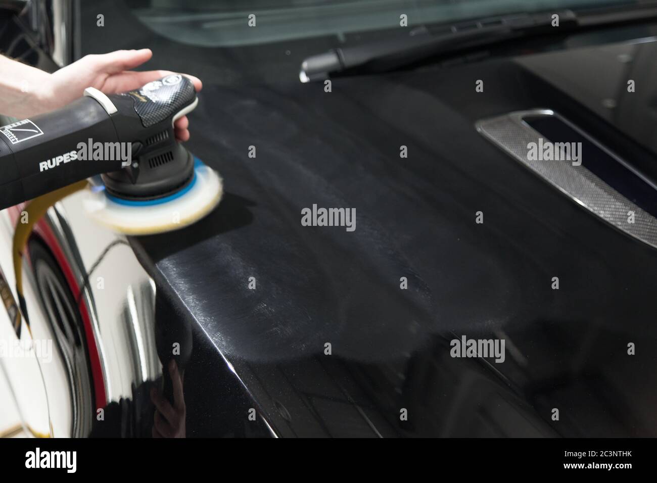 LONDON, UNITED KINGDOM Sep 12, 2017 Detailer working with a Rupes