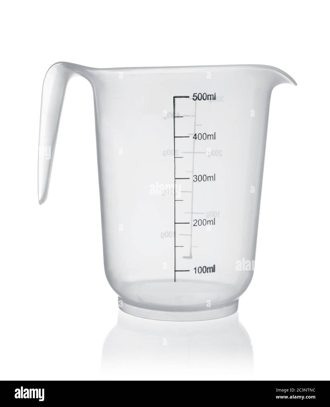 Empty measuring plastic cup with handle isolated on white. Stock Photo