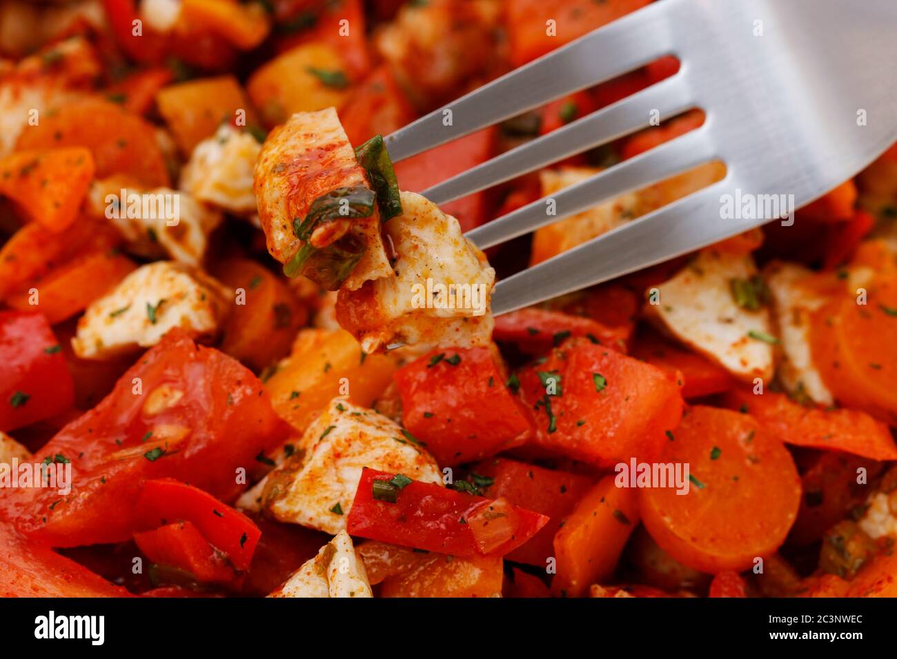 Mixed vegetables with chicken on frying pan. Cooking time Stock Photo Alamy