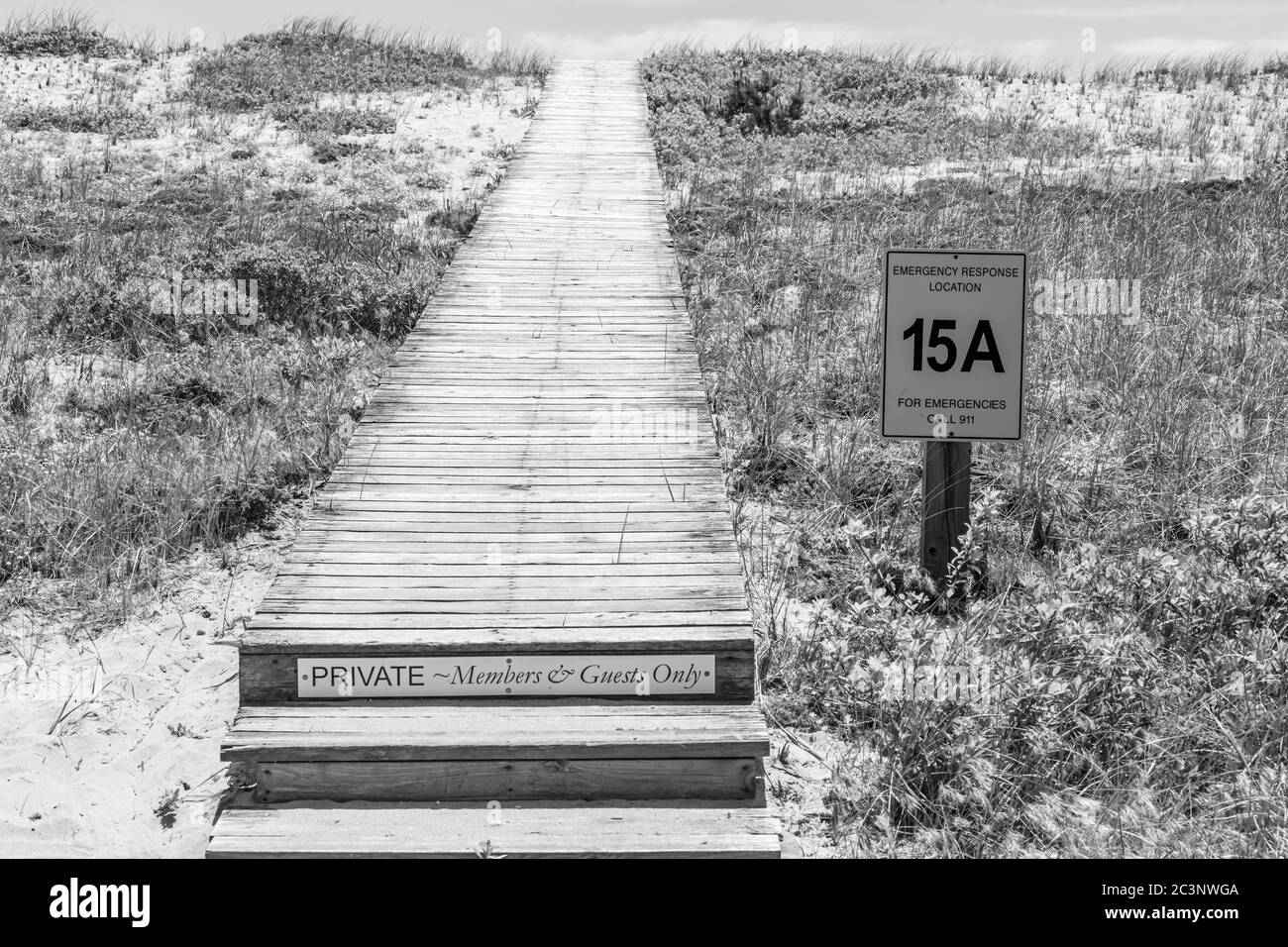 Long wooden walkway to beach in Amgansett, NY Stock Photo